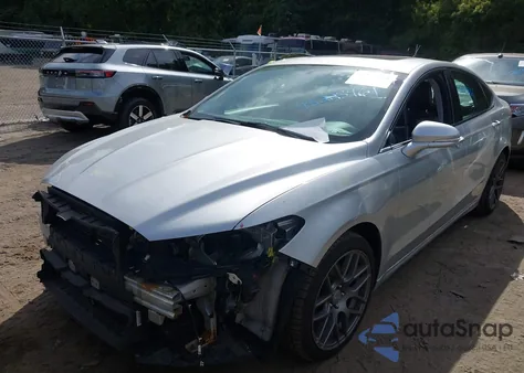 2016 Ford Fusion Titanium z USA, uszkodzony, nr VIN 3FA6P0K98GR135129